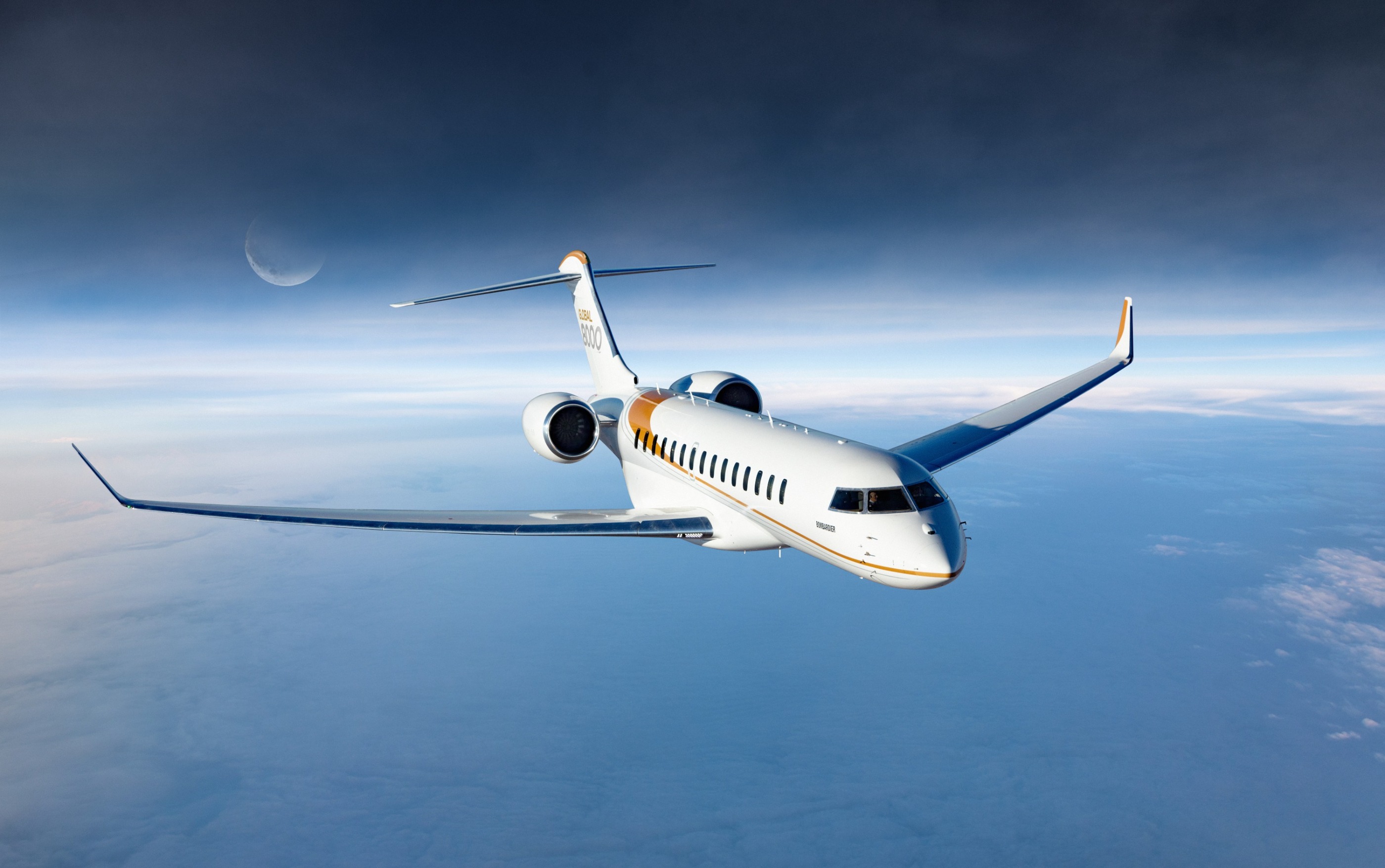 Bombardier Global 8000 flying in the skies, with in the background the moon and an intense blue