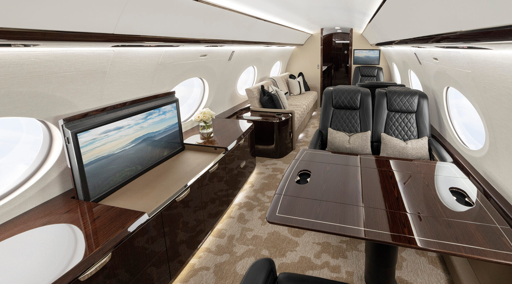 Gulfstream G800 cabin — four modular living areas with conference table and panoramic oval windows